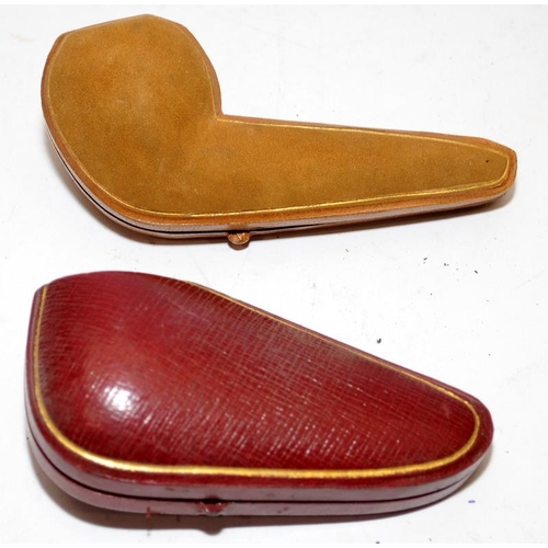 260 - Two quality antique pipes with hallmarked silver collar and butterscotch amber stem. Presented in un... 