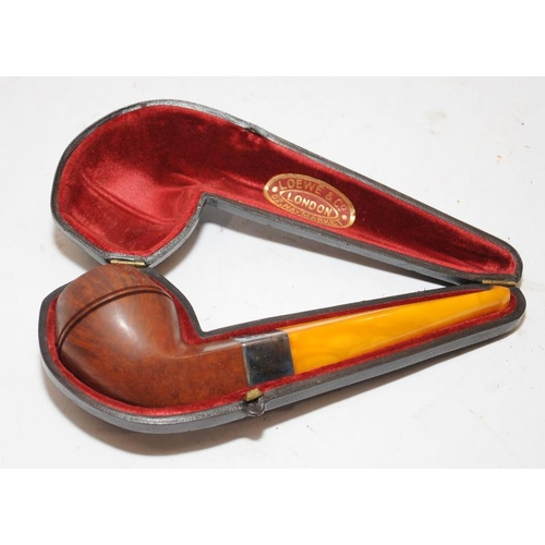 259 - Quality antique pipe with hallmarked silver collar and butterscotch amber stem. Presented in unused ... 