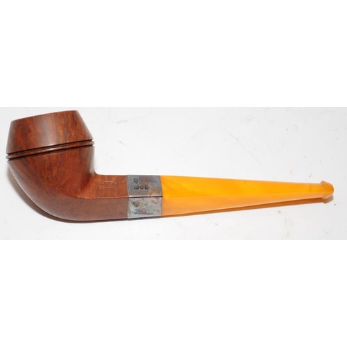 259 - Quality antique pipe with hallmarked silver collar and butterscotch amber stem. Presented in unused ... 