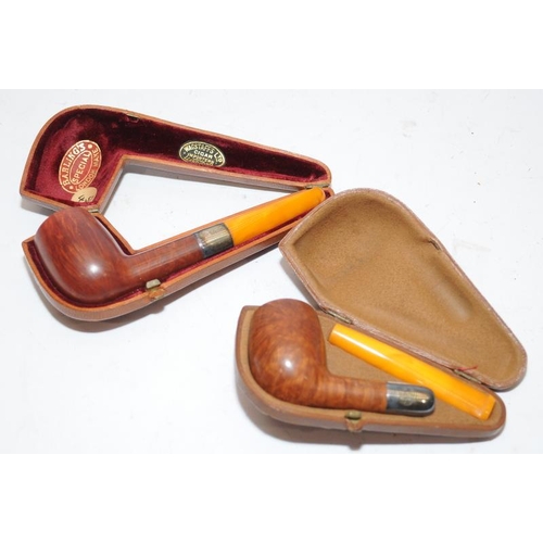 257 - Two quality antique pipes by Barlings and Charles Maas with hallmarked silver collars and butterscot... 