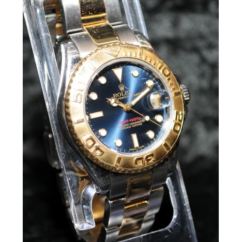 22 - Rolex Yachtmaster Superlative Chronometer. Factory blue dial with bi-metal Oyster bracelet. 35mm mod... 