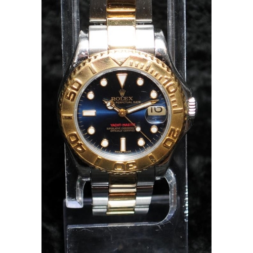 22 - Rolex Yachtmaster Superlative Chronometer. Factory blue dial with bi-metal Oyster bracelet. 35mm mod... 