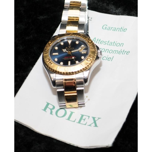 22 - Rolex Yachtmaster Superlative Chronometer. Factory blue dial with bi-metal Oyster bracelet. 35mm mod... 