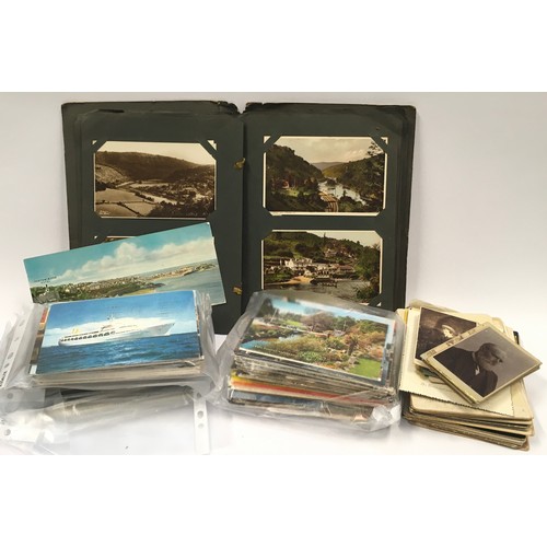 212 - Antique album containing early postcards together with some modern postcards and a collection of Vic... 