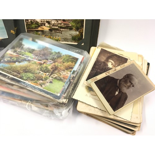 212 - Antique album containing early postcards together with some modern postcards and a collection of Vic... 