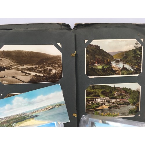 212 - Antique album containing early postcards together with some modern postcards and a collection of Vic... 