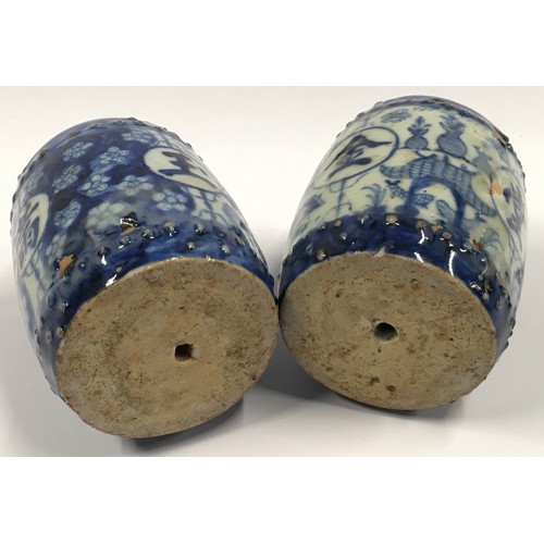 153 - Pair Chinese blue and white ceramic weights each measuring 9cm tall.