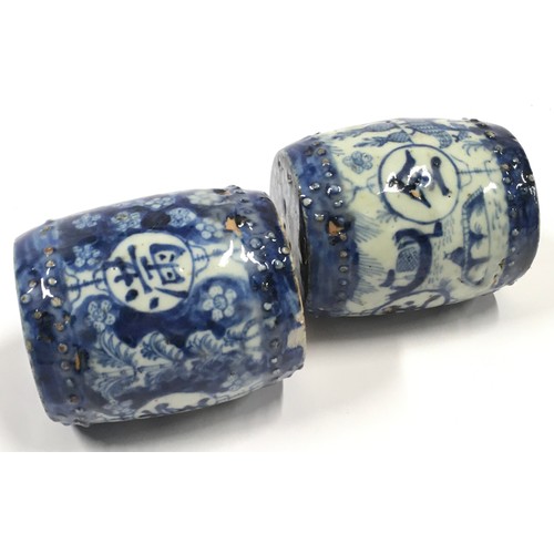 153 - Pair Chinese blue and white ceramic weights each measuring 9cm tall.