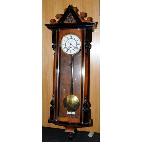 335 - Walnut single weight Ebonized enamel dial Vienna wall clock with brass pendulum by 