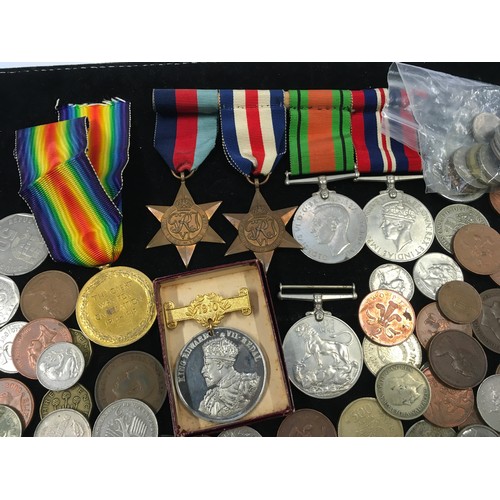 233 - Collection of medals together with a collection of GB and Foreign coinage.