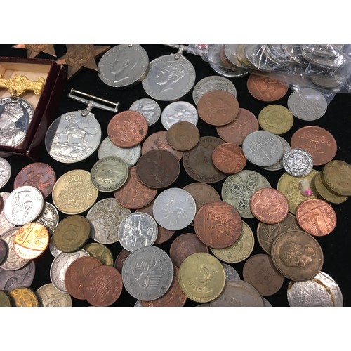 233 - Collection of medals together with a collection of GB and Foreign coinage.