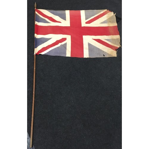 294 - Vintage flag pole with weathered Union Jack flag attached. Pole 189cm long, flag 110x80cm.