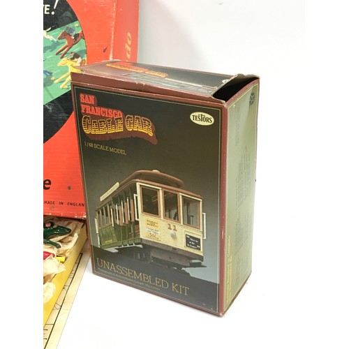 282 - Vintage boxed Escalado horse racing game appears complete together with a San Francisco Cable Car mo... 