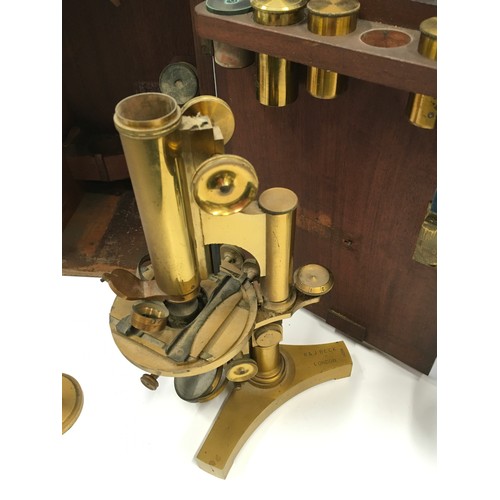 288 - J Swift & Son Antique Victorian microscope with some lenses in wooden case together with another by ... 