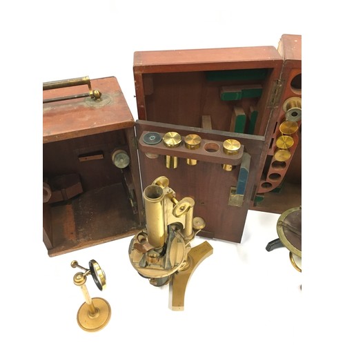 288 - J Swift & Son Antique Victorian microscope with some lenses in wooden case together with another by ... 