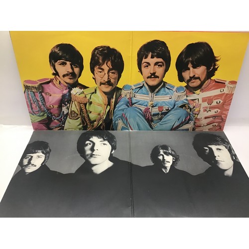 145A - BEATLES RELATED ALBUMS. This lot includes 4 vinyl LP records to include- Love Songs - Somewhere in E... 