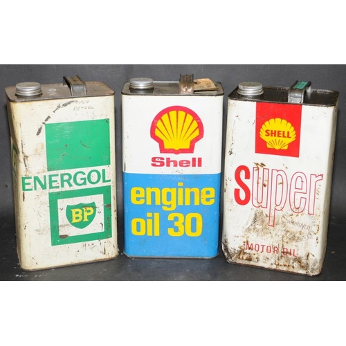 278 - Collection of three vintage one gallon advertising oil cans to include BP Energol, Shell Engine Oil ... 