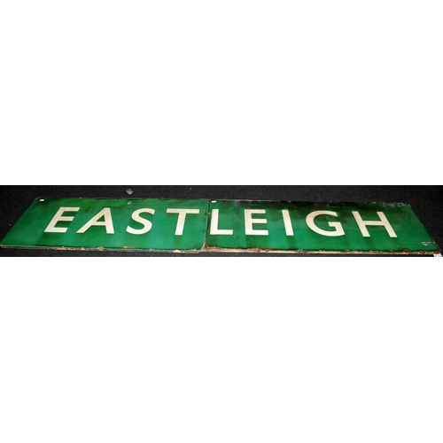 301 - Very large enamel railway station sign 'Eastleigh' on wooden frame. In two parts, overall size 370cm... 