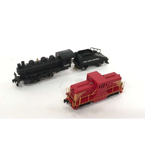 144 - Bachmann/Spectrum N Scale locomotives: 81852 44 Ton Diesel Switcher loco Red & Yellow and 50570 Stea... 