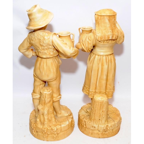 8 - Pair of Robinson & Leadbetter Ivory Parian ware figures of a peasant boy and girl carrying water ewe... 