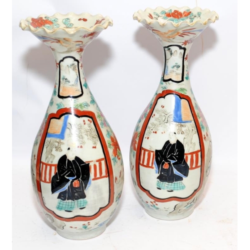 9 - Pair of 19th century Oriental bottle vases with flared scallop edged rims featuring figures in panel... 