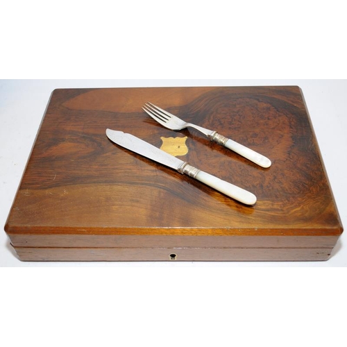 95 - Two complete canteens of cutlery in hinged wooden cases to include a fish set with faux MOP handles ... 