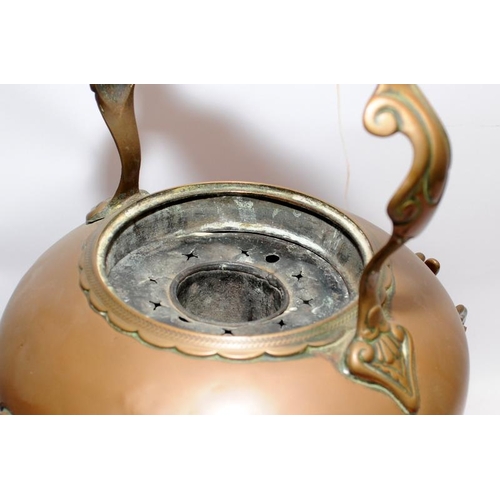 97 - Very large decorative Victorian copper kettle with ceramic handles on an ornate stand with internal ... 