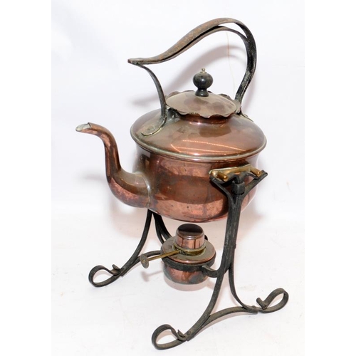 99 - Two antique spirit kettles on stands c/w original burners. One copper and the other is silver plated... 