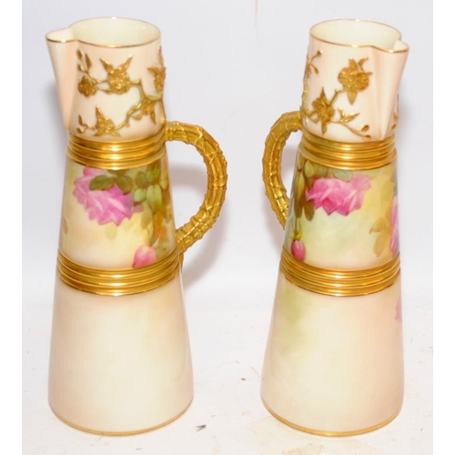 105 - Sedgley signed pair of Royal Worcester gilded blush ivory Oriental inspired water jugs with hand pai... 