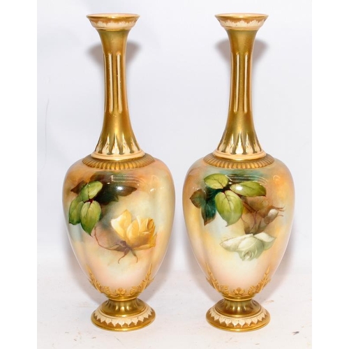 114 - Signed Hood pair of Royal Worcester gilded blush ivory baluster vases with hand painted floral decor... 