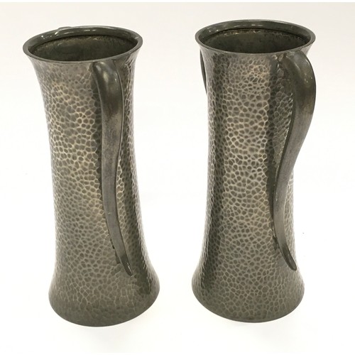 56 - Pair of Arts & Crafts Sillustre Pewter vases each 18cm tall.