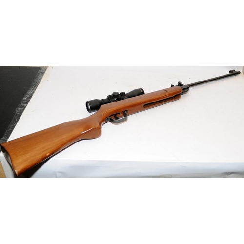 300 - Vintage SMK 17 .177 break barrel air rifle with fitted SMK 4x32 scope. Cocks and discharges, not tes... 