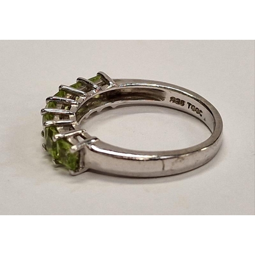 323 - 925 silver 1/2 eternity ring set with 7 tourmaline stones.