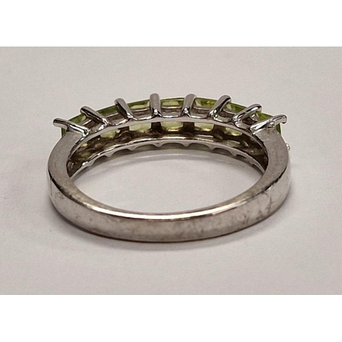 323 - 925 silver 1/2 eternity ring set with 7 tourmaline stones.