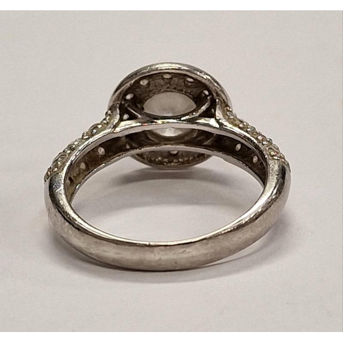 386 - 925 silver ring with halo setting. Size M.