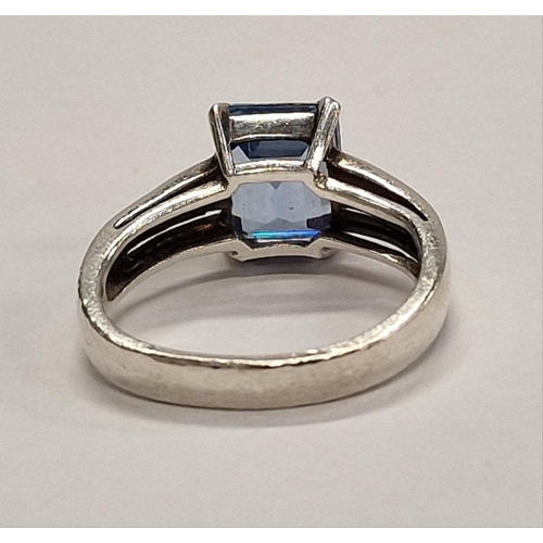 398 - 925 silver Ring with emerald cut blue stone. Size M.