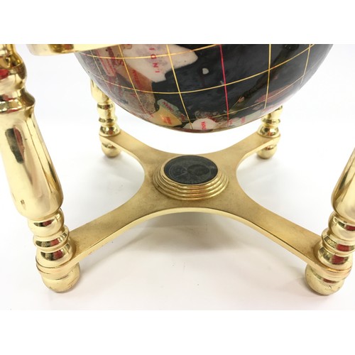 15 - Contemporary small gem set revolving globe of the world 25cm diameter approx.