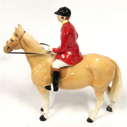 17 - Palomino horse and rider 21cm tall.