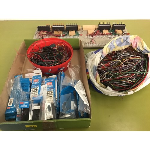 221 - Bag/container of Peco point motors (approx 28) and two switch panels together with a large quantity ... 