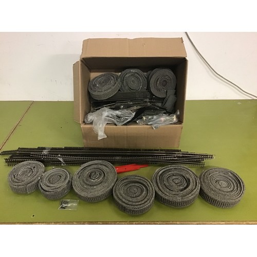 224 - Box containing a large quantity of OO track - Hornby/Peco in the main, but may be others. Many diffe... 