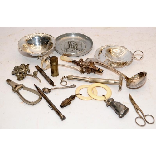 410 - A collection of vintage silver plated curios to include baby soothers