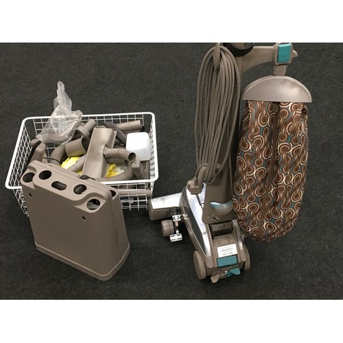 185 - Kirby Sentria vacuum cleaner with large collection of accessories and spare dust bags.