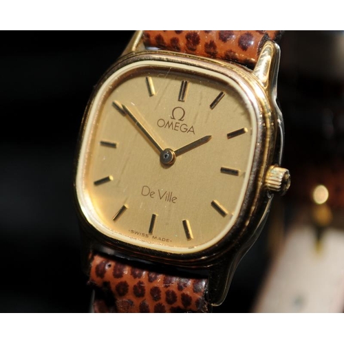 395 - An Omega Deville gold capped wristwatch.