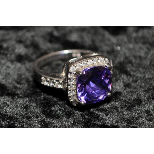 376 - A large 925 and amethyst ring Size L 1/2.