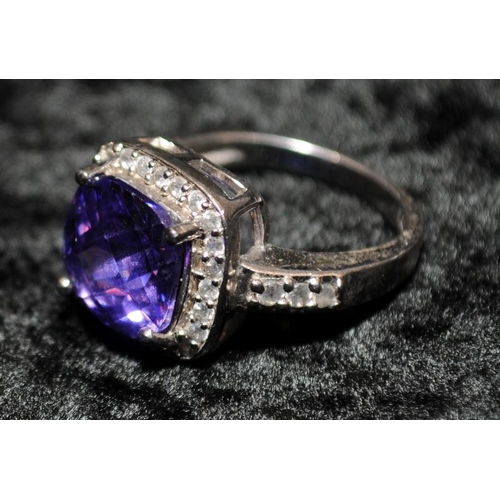 376 - A large 925 and amethyst ring Size L 1/2.