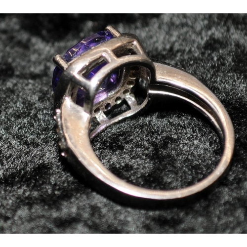 376 - A large 925 and amethyst ring Size L 1/2.