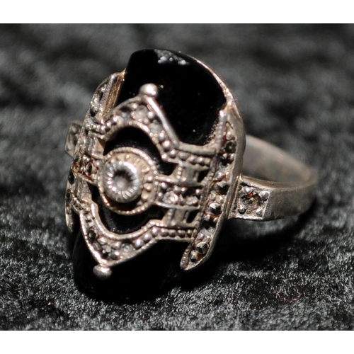 321 - A 925 silver marcasite and onyx ring Size K