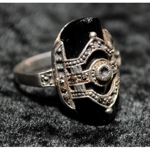 321 - A 925 silver marcasite and onyx ring Size K