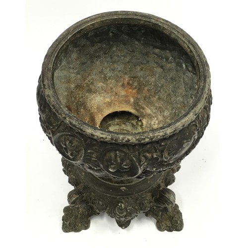 107 - Antique cast metal urn 22cm tall.