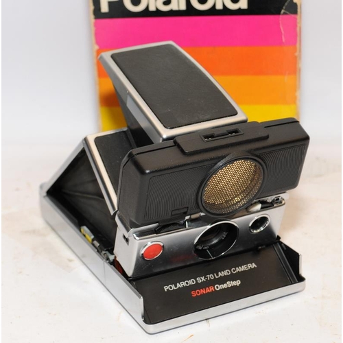 149 - Polaroid SX-70 Land Camera Sonar One Step in original (tatty) box. Being offered in good cosmetic co... 